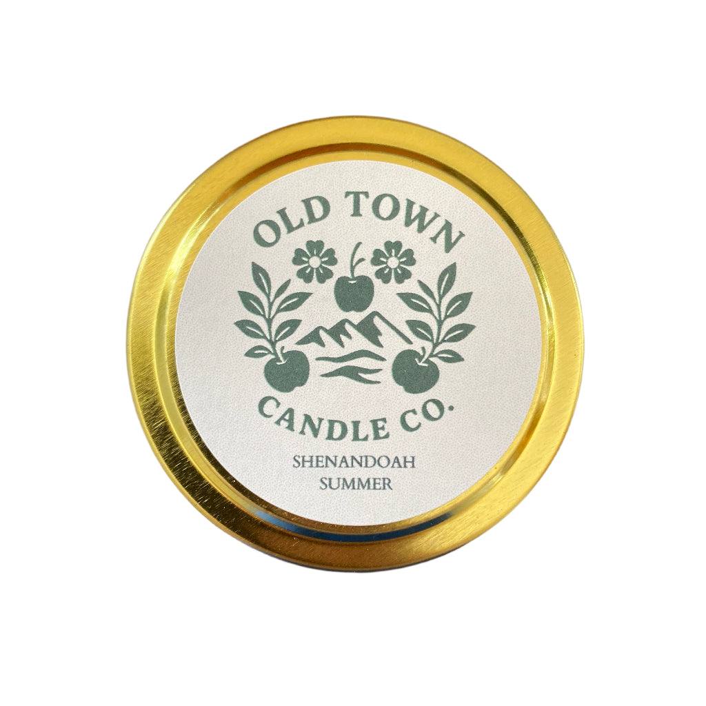 Gold tin candle labeled Old Town Candle Co. Shenandoah Summer